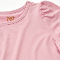 Close up flat lay image of the shoulder detail on the Mauve Blush Puff Sleeve Tee