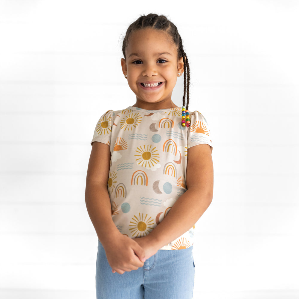 Alternate image of a child wearing a Desert Sunrise Puff Sleeve Tee and Light Blue Denim Jegging