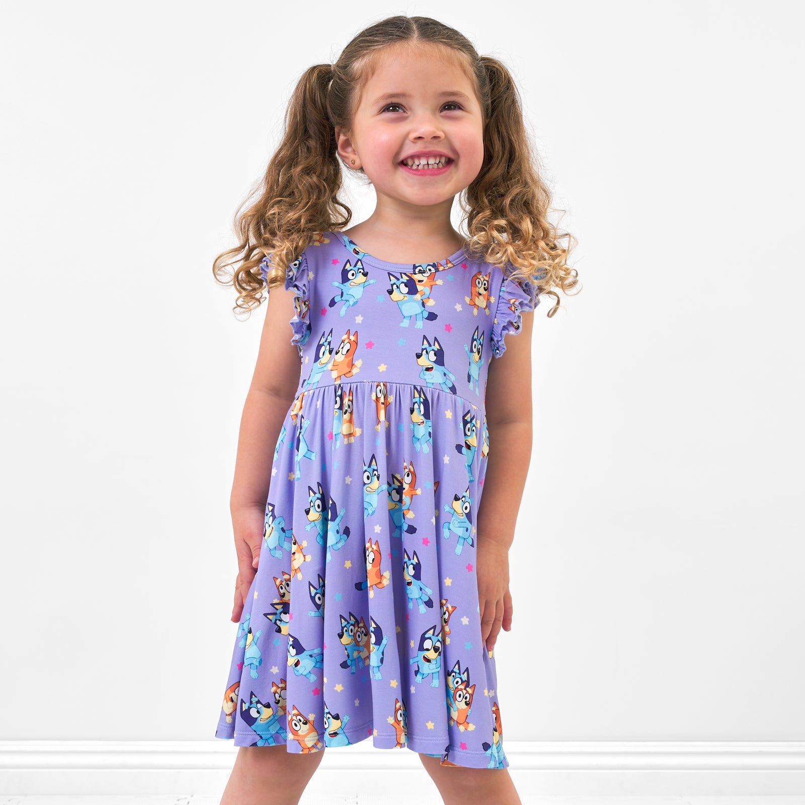Child wearing a Bluey flutter twirl dress