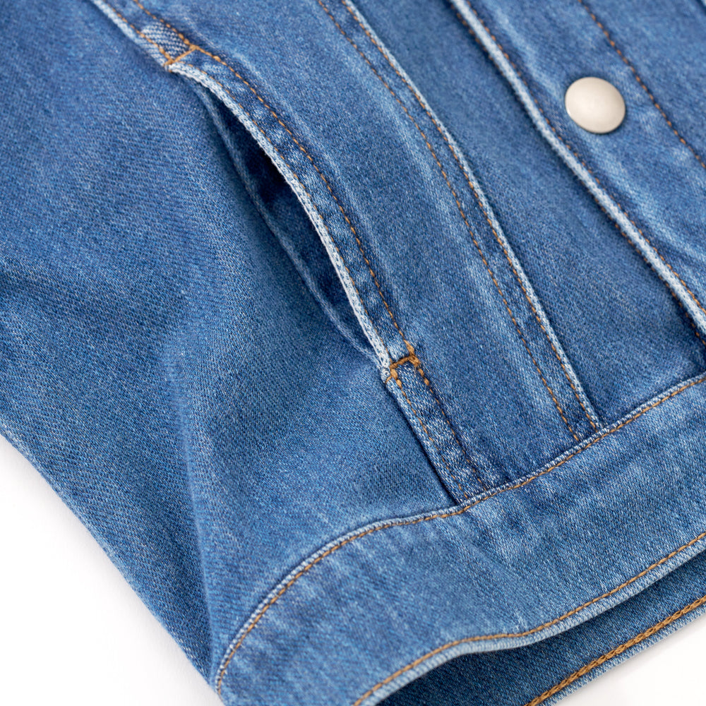 Close up image of the side pocket detail for the Midwash Blue/Gray Denim Jacket
