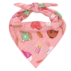 Flat lay image of a pink All Stars pet bandana