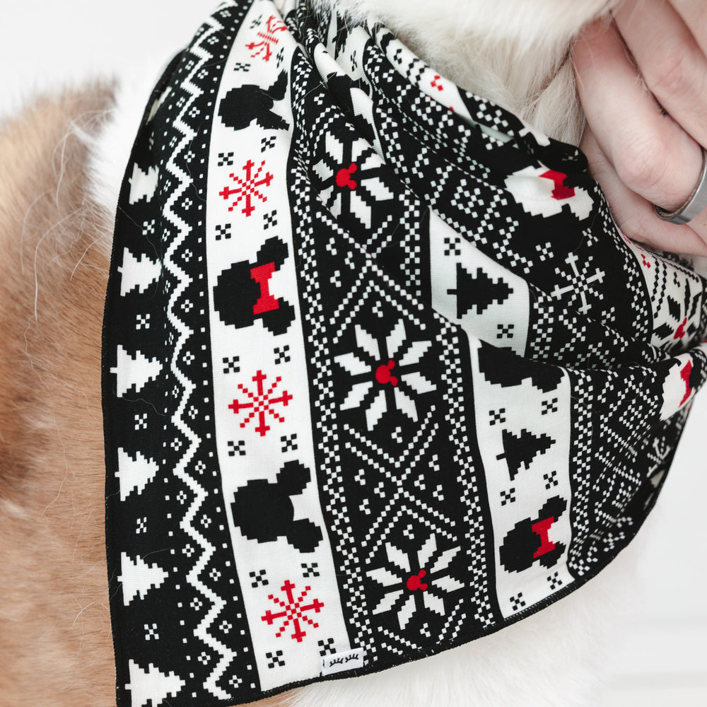 Close up image of a dog wearing a Mickey Fair Isle pet bandana 