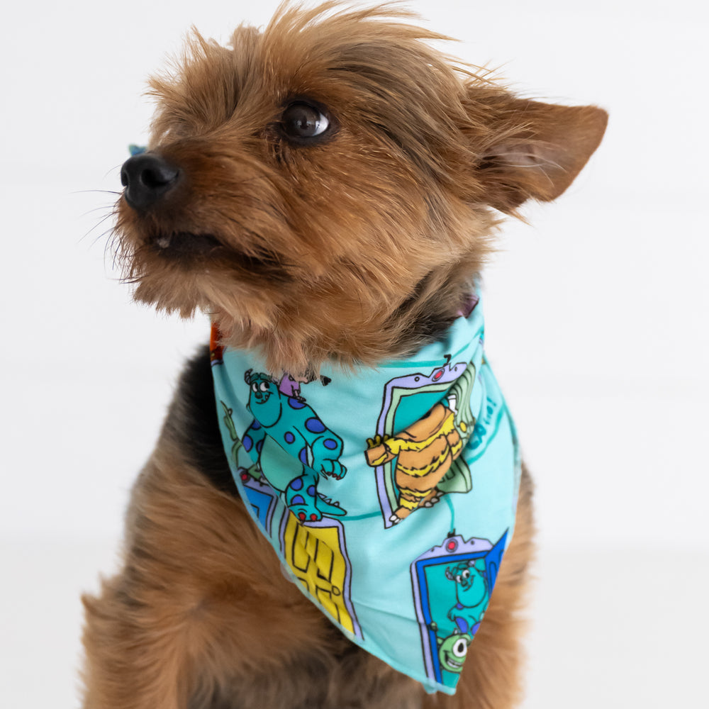 Brown dog wearing the Disney Monsters, Inc. Scream Team Pet Bandana