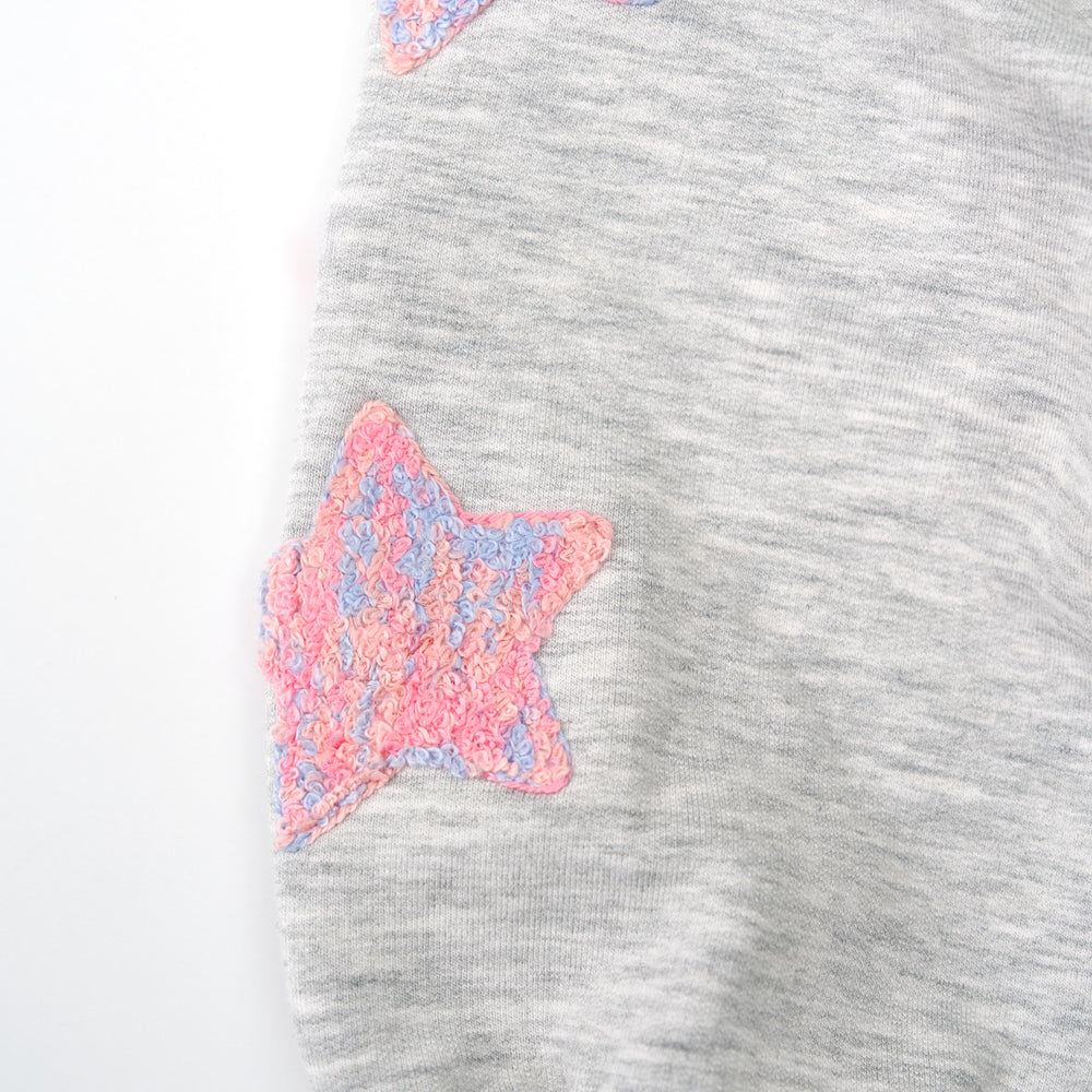 Close up detail shot of the Light Heather Gray Drop Shoulder Crewneck detailing the stars on the sleeve