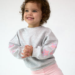 Smiling girl wearing the Light Heather Gray Drop Shoulder Crewneck