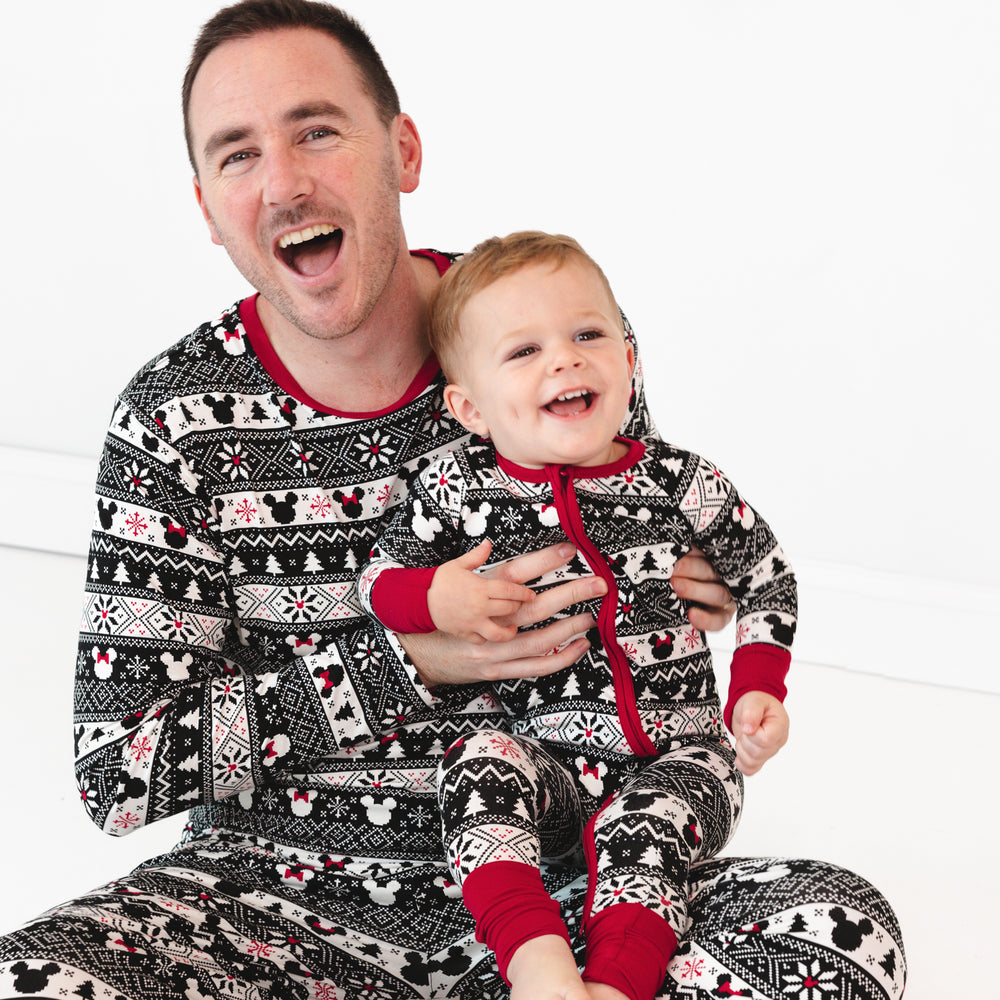 father and his child wearing matching Mickey Fair Isle pjs in men's and children's styles