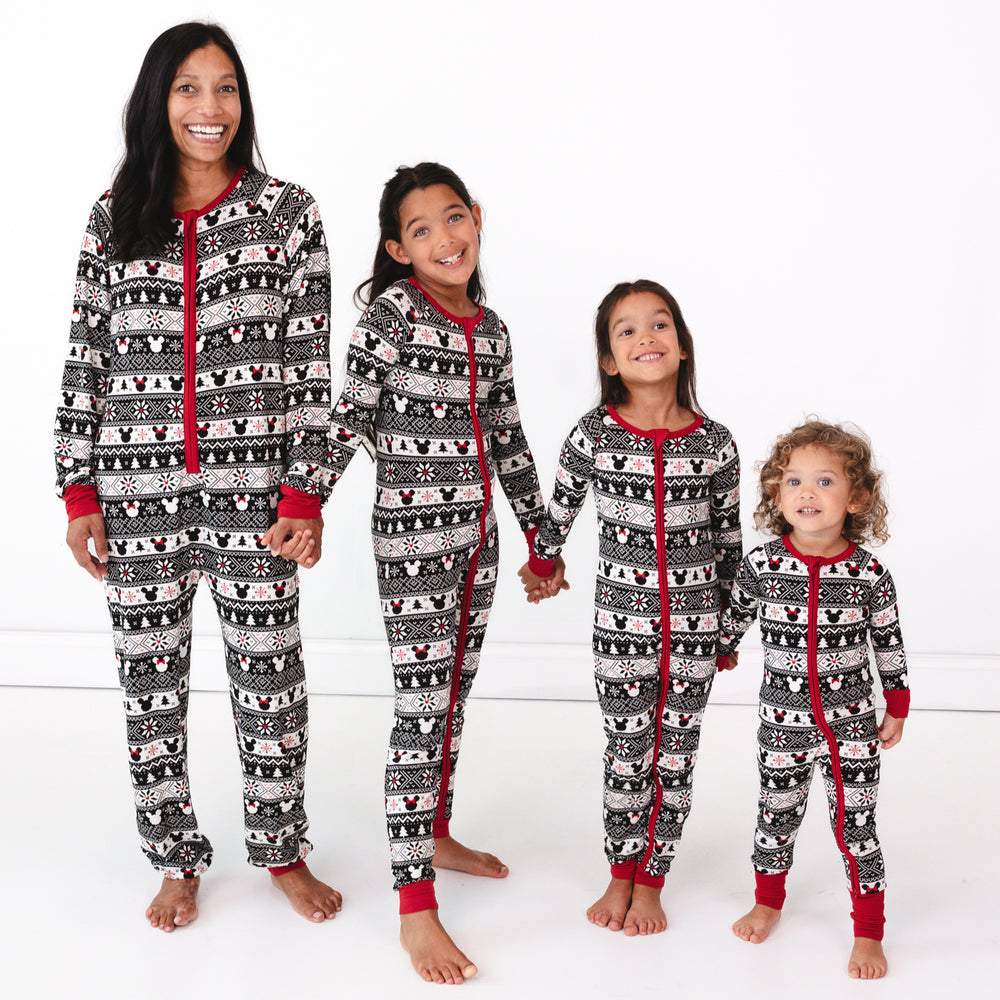 Woman and her three children wearing matching Mickey Fair Isle zippies in adult and children's sizes