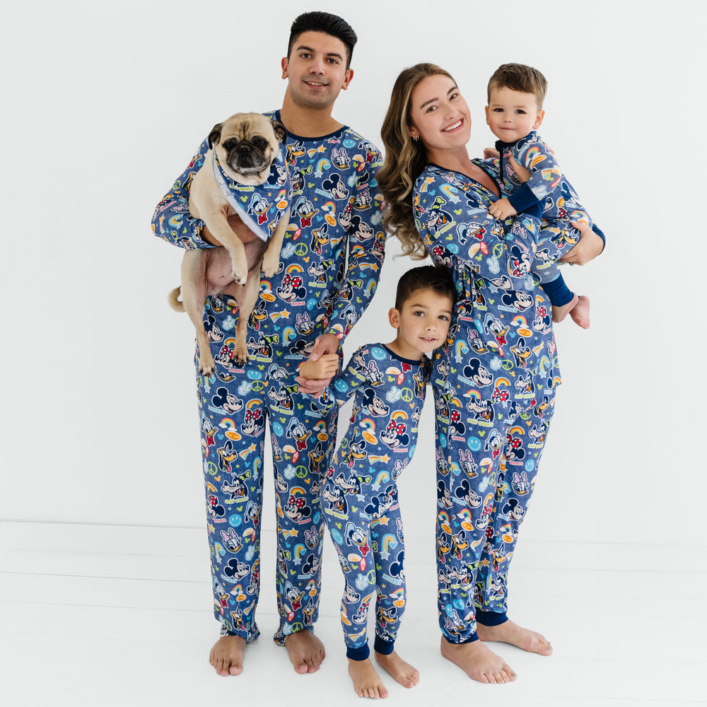 Family of four and a dog wearing matching  Navy Disney Mickey's Clubhouse bamboo pajama sets