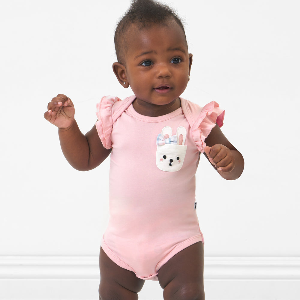 Click to see full screen - Child wearing a Pink Blossom flutter pocket bodysuit