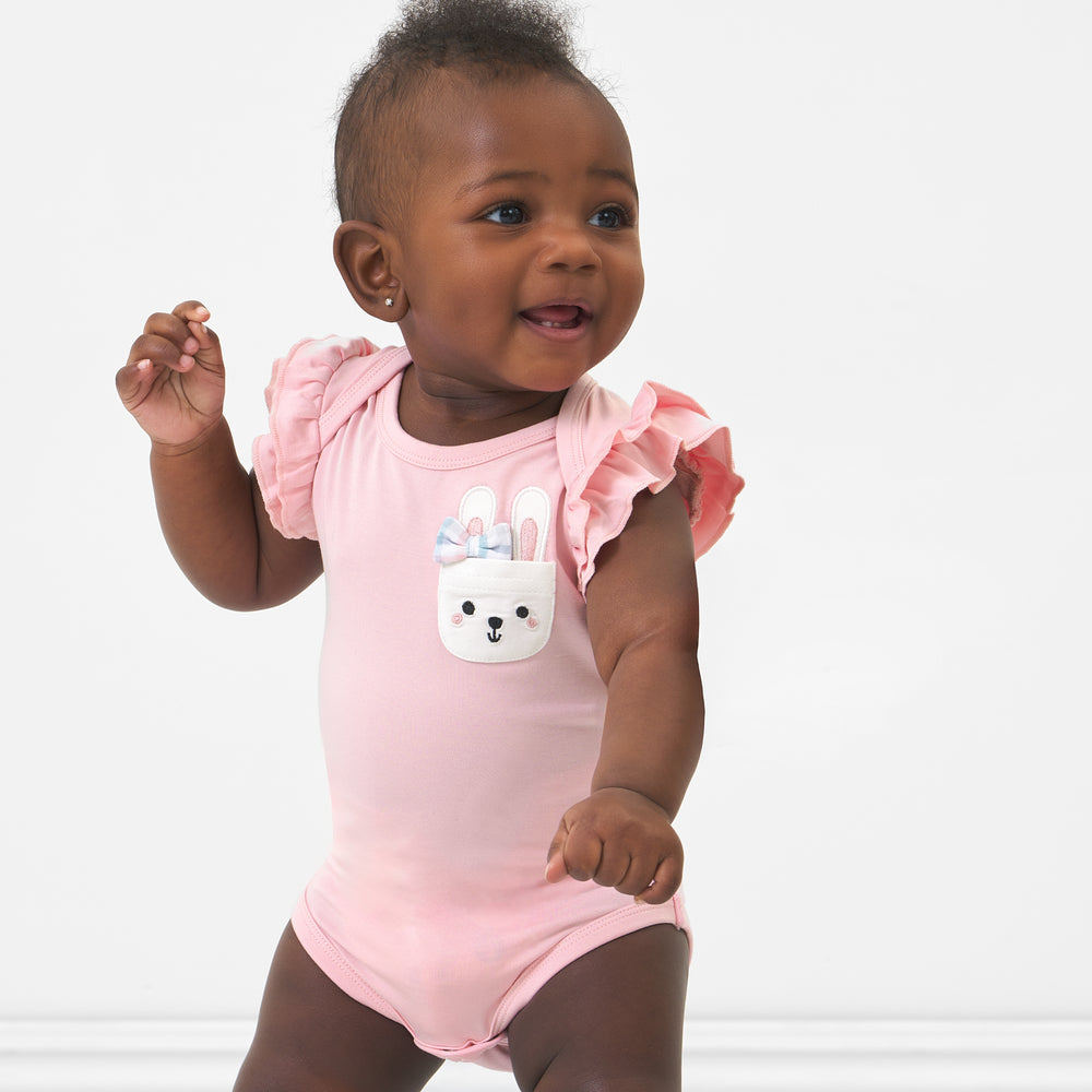Click to see full screen - Alternate image of a child wearing a Pink Blossom flutter pocket bodysuit