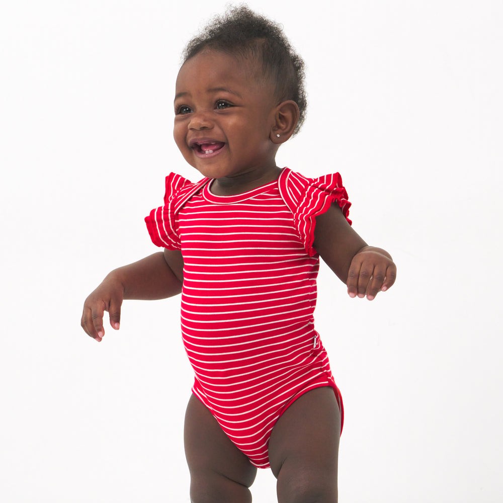 Child wearing a Candy Red Stripes flutter bodysuit