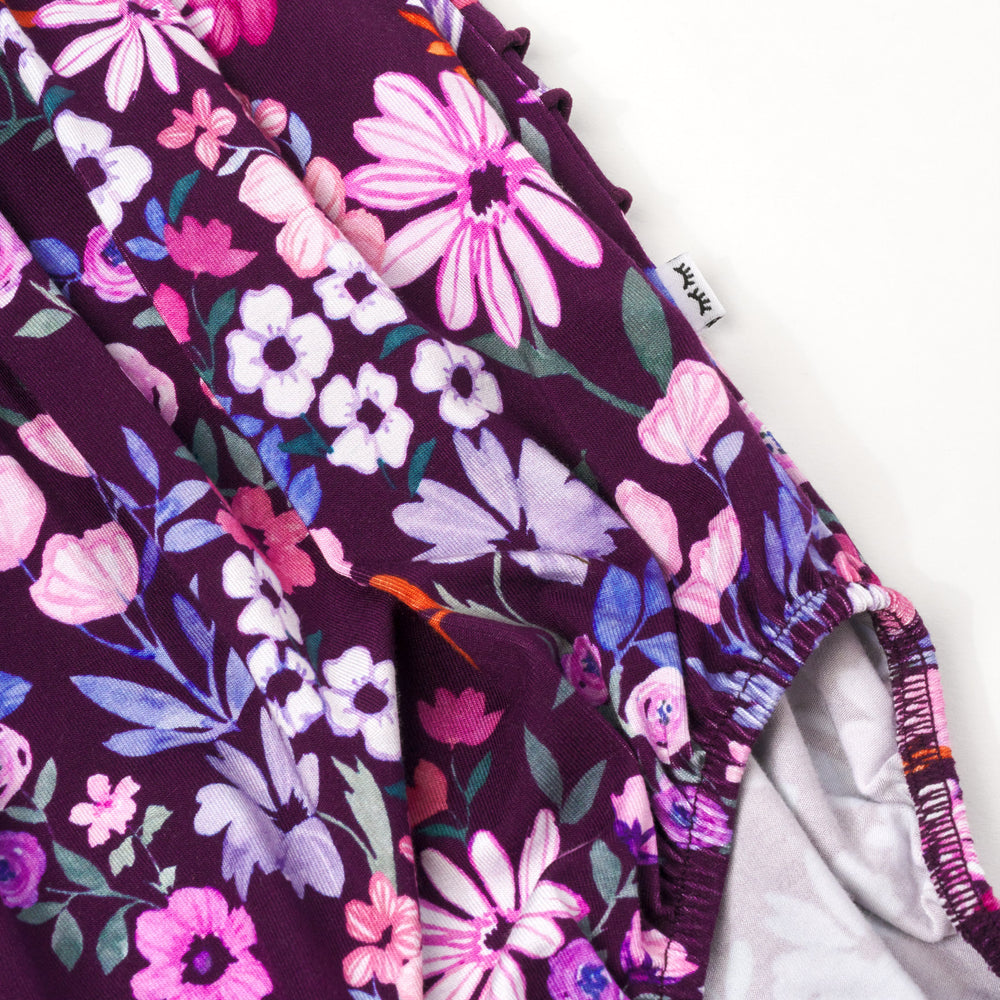 Alternate close up flat lay image of Violet Meadow Bubble Romper