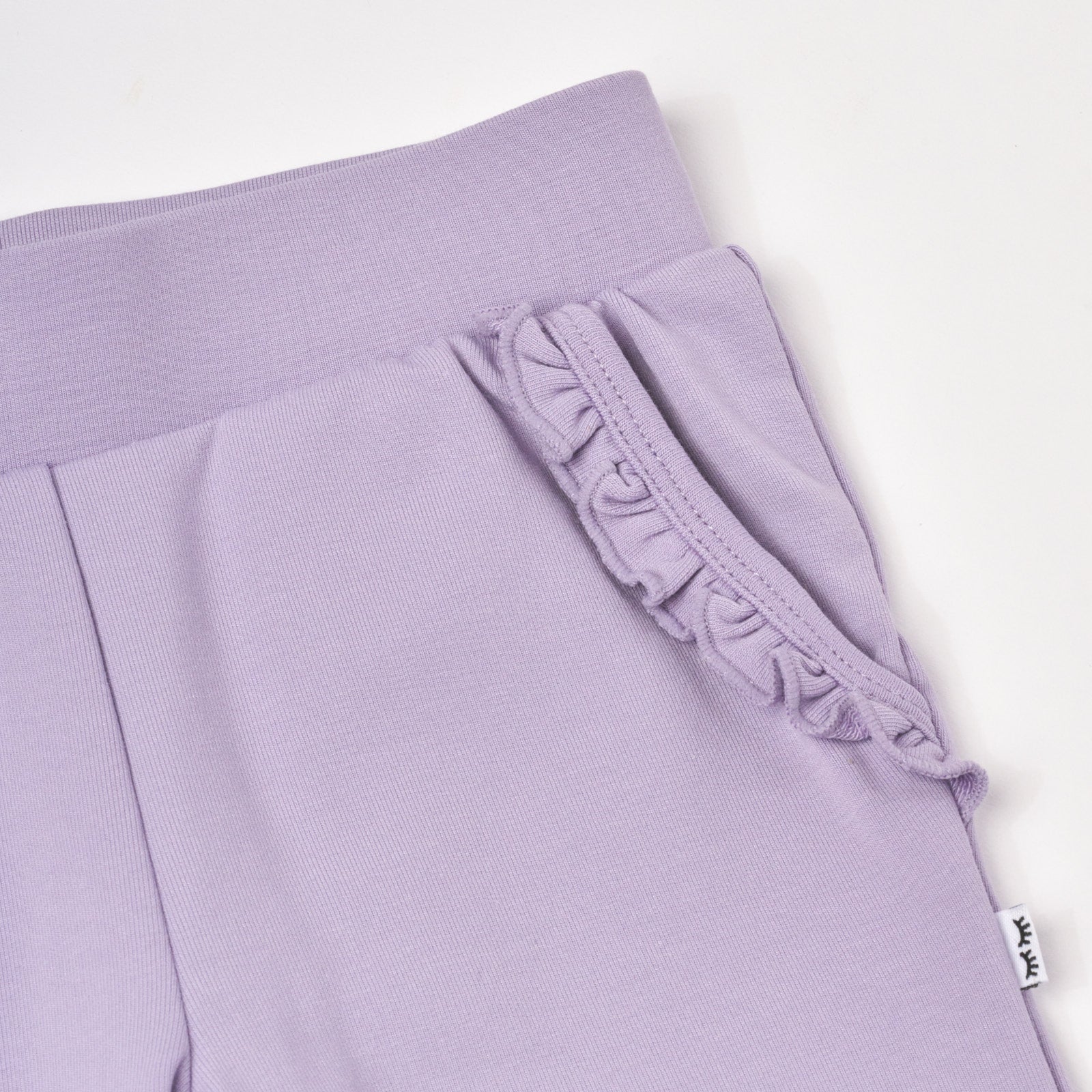 Close up flat lay image of Dusty Lavender Ruffle Jogger