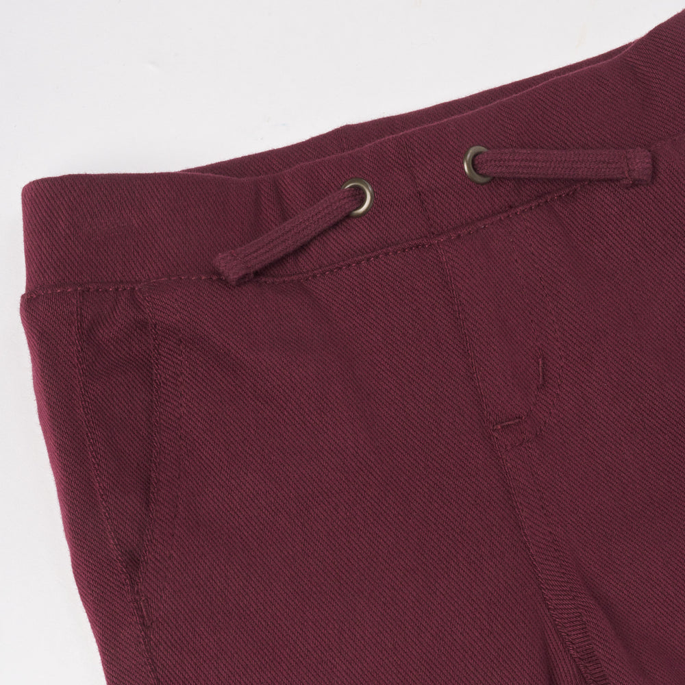 Close up flat lay image of Classic Burgundy Denim Jogger