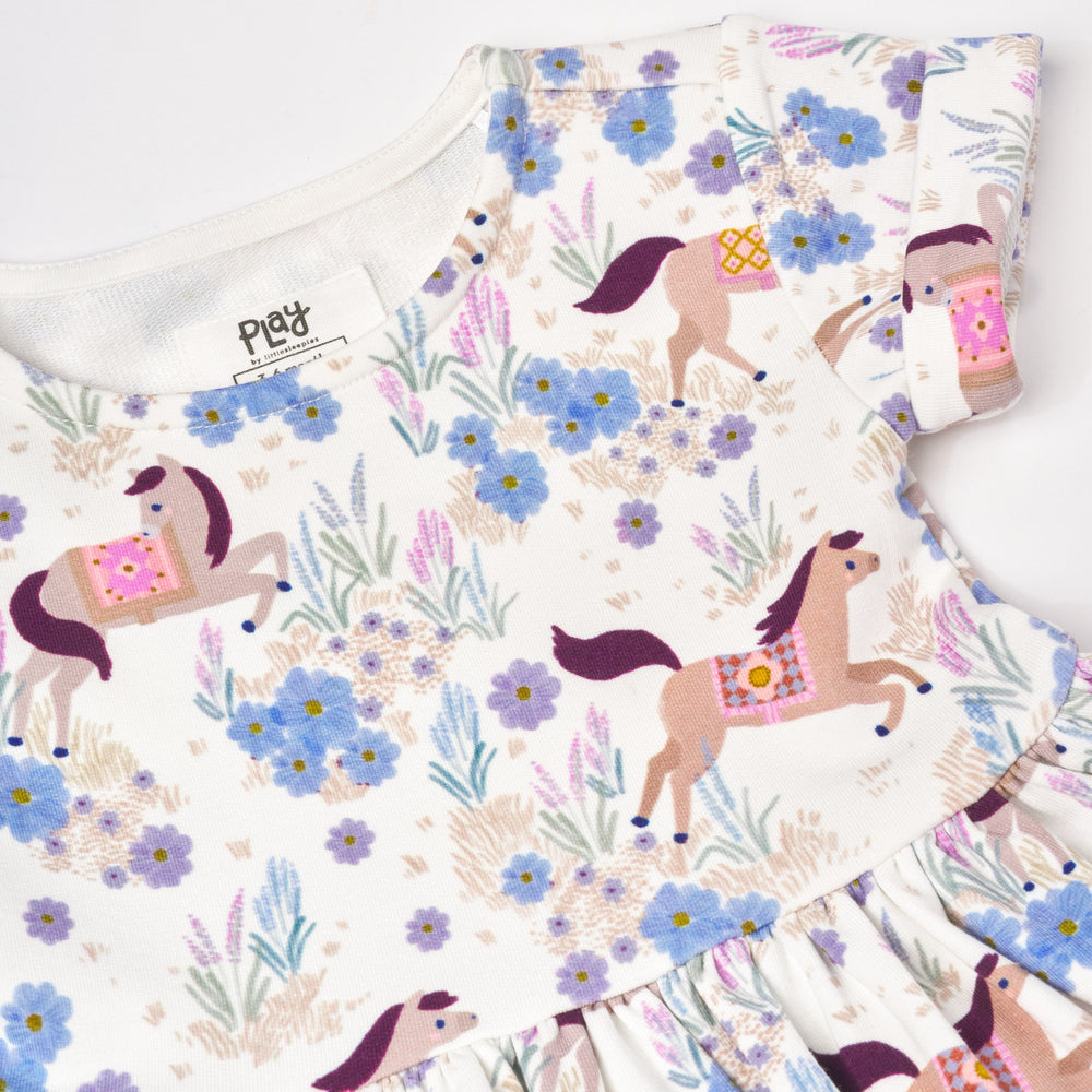 Close up flat lay image of Wildflower Ride Patch Pocket Dress