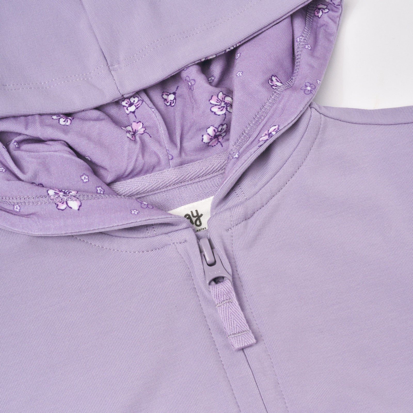 Close up flat lay image of Dusty Lavender Ruffle Hoodie