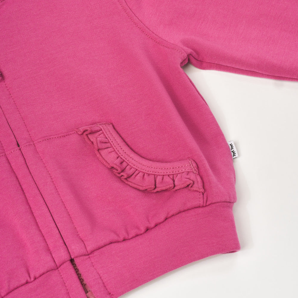 Close up flat lay image of Berry Rose Ruffle Hoodie detailing the pocket