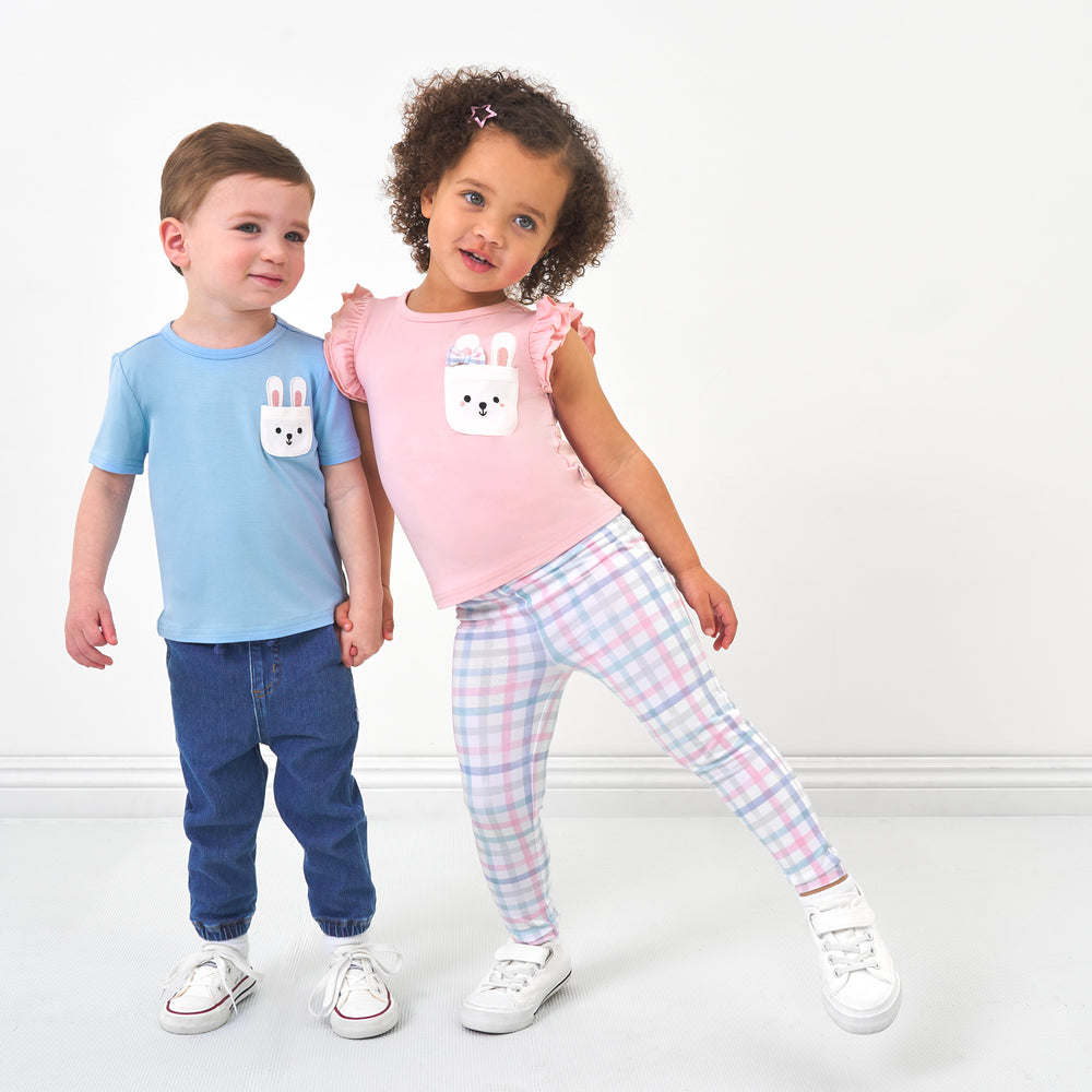 Click to see full screen - Two children wearing coordinating Easter Play outfits by Little Sleepies