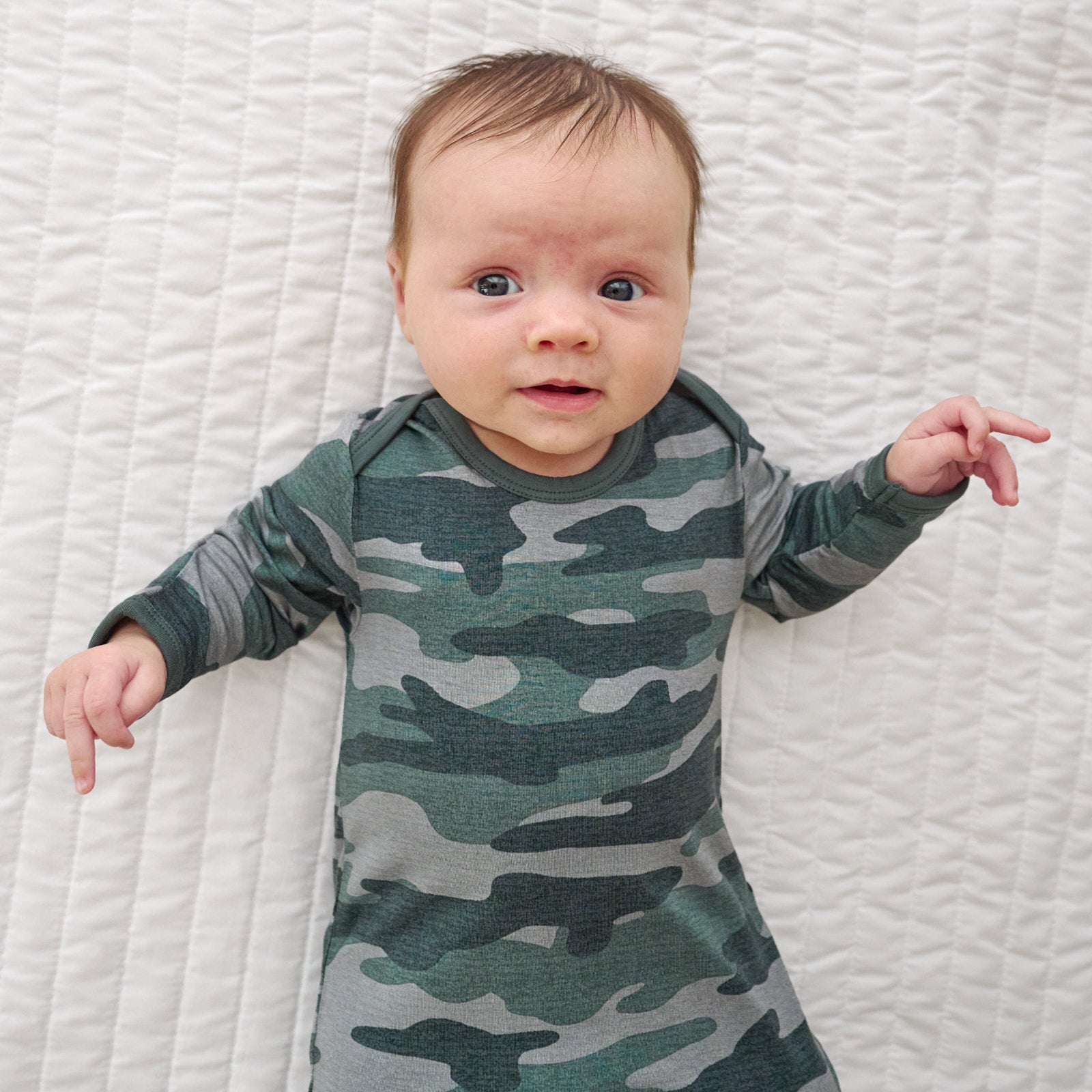 Top view close up image of shoulder detail with baby wearing the Vintage Camo Infant Gown