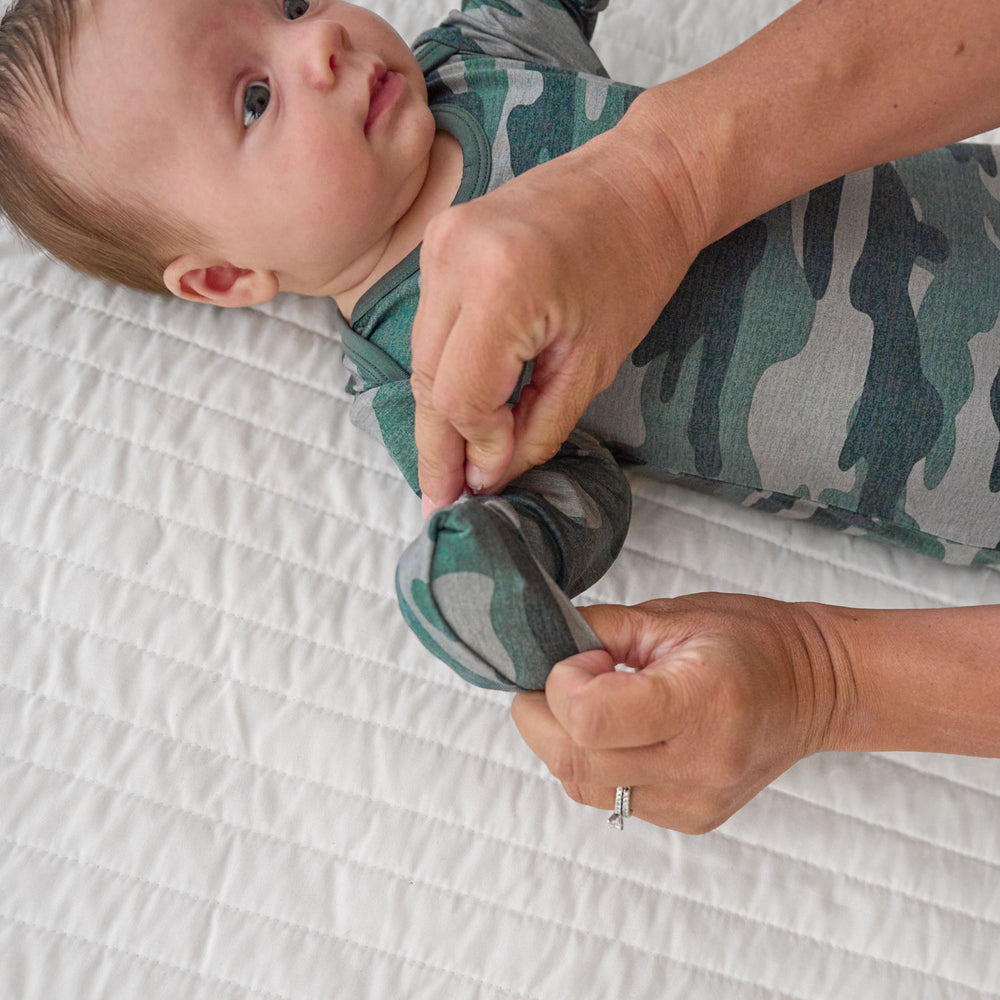 Alternative top view image of hand fold over detail on the Vintage Camo Infant Gown