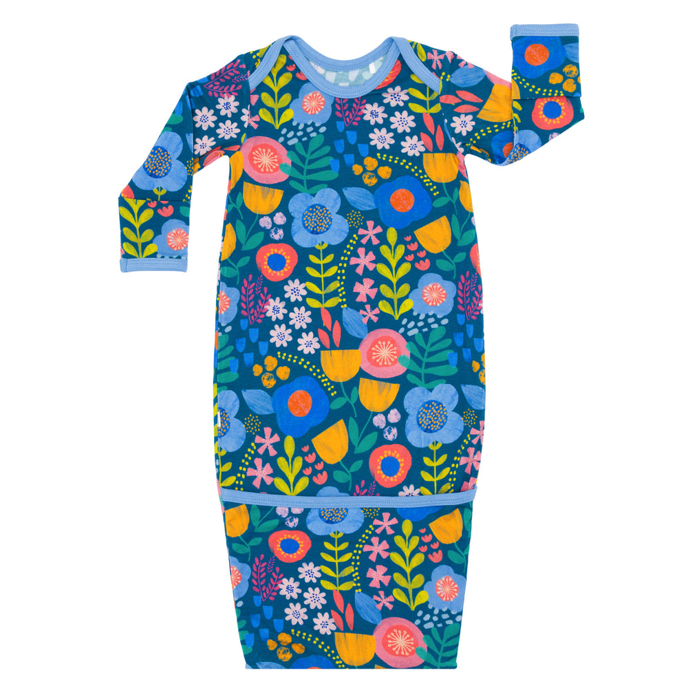 Flat lay image of the Folk Floral Infant Gown