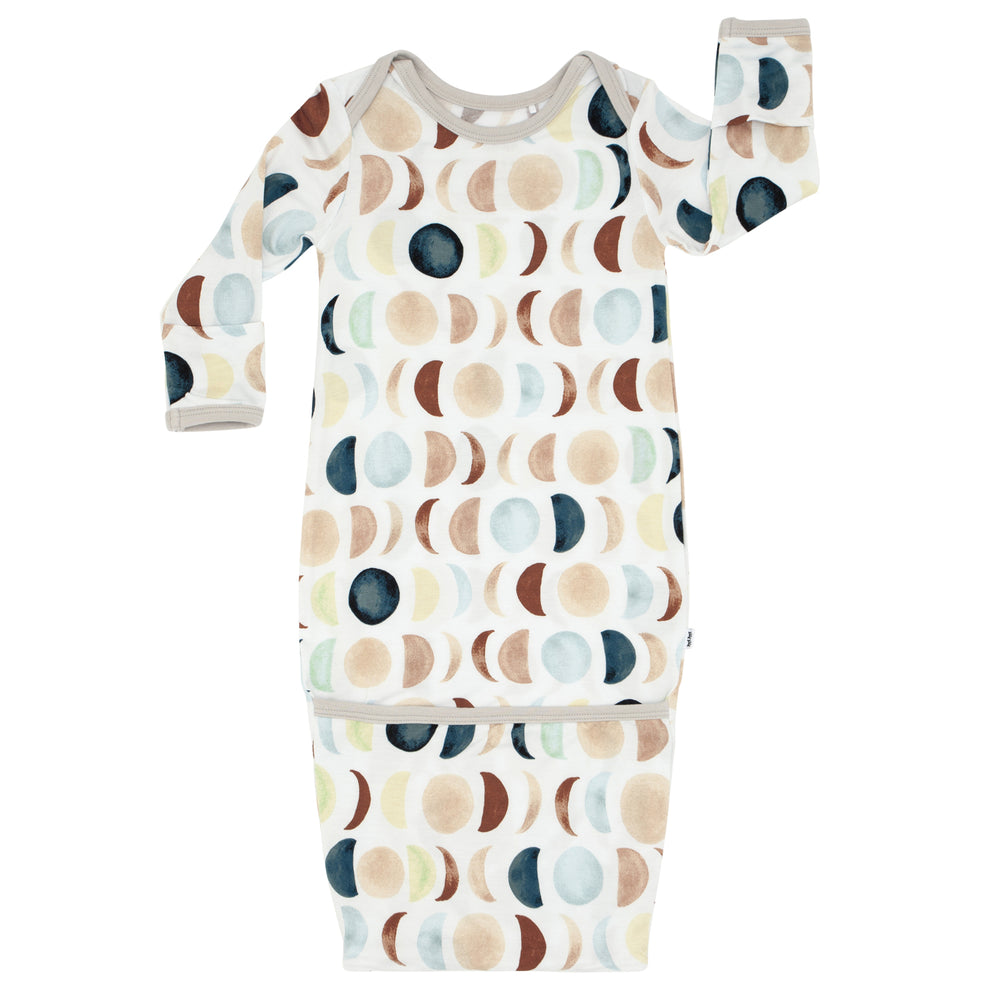 Flat lay image of a Luna Neutral Infant Gown