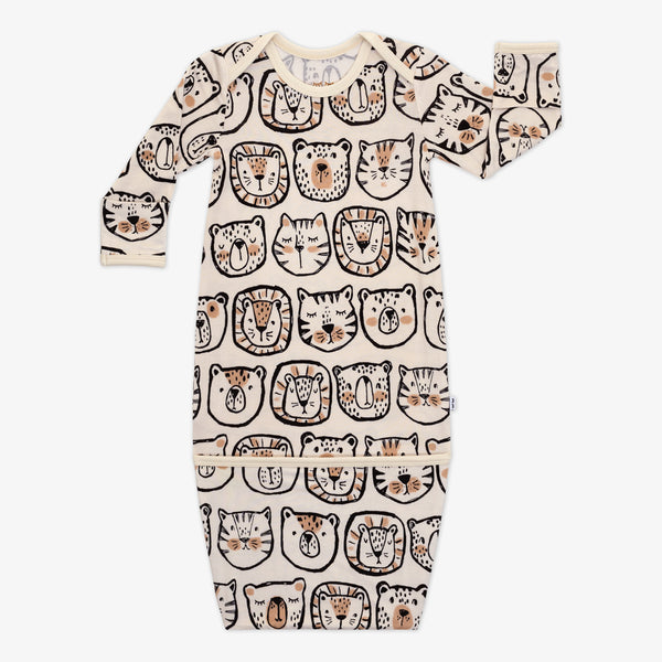 Flat lay image of a Lions, Tigers, and Bears infant gown