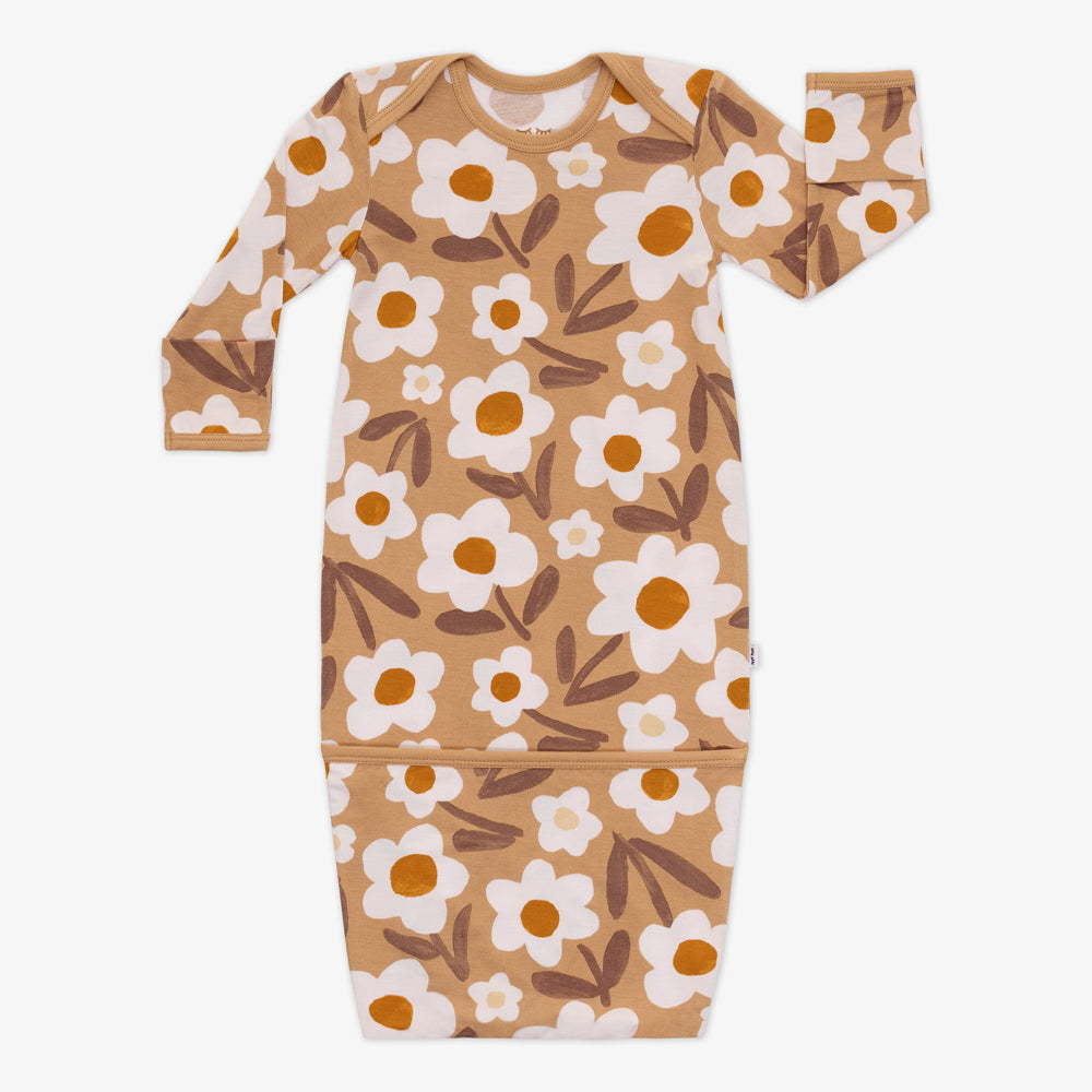 Flat lay image of a Daisy Daydream infant gown