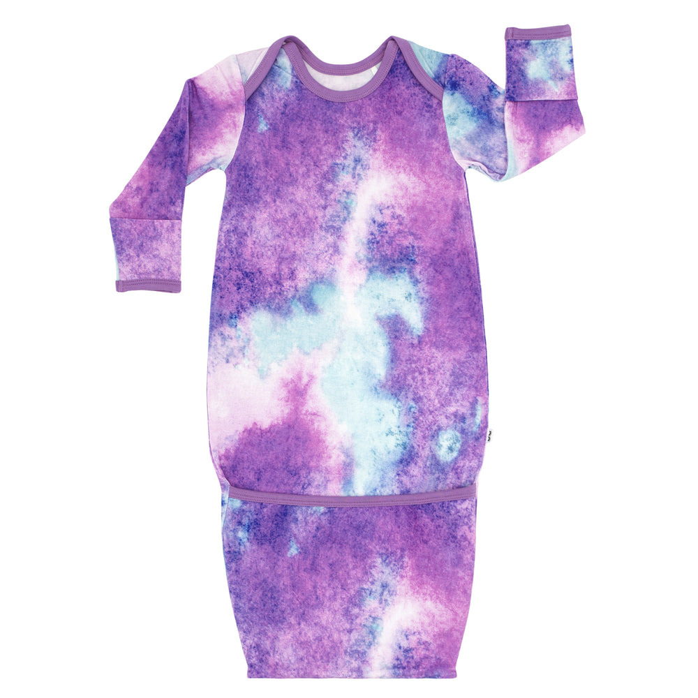 Flat lay image of a Purple Watercolor Infant Gown