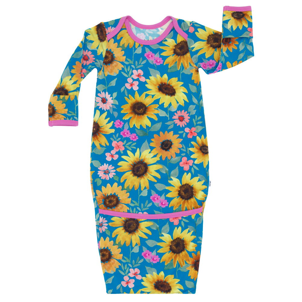 Flat lay image of the Sunflower Fields Infant Gown