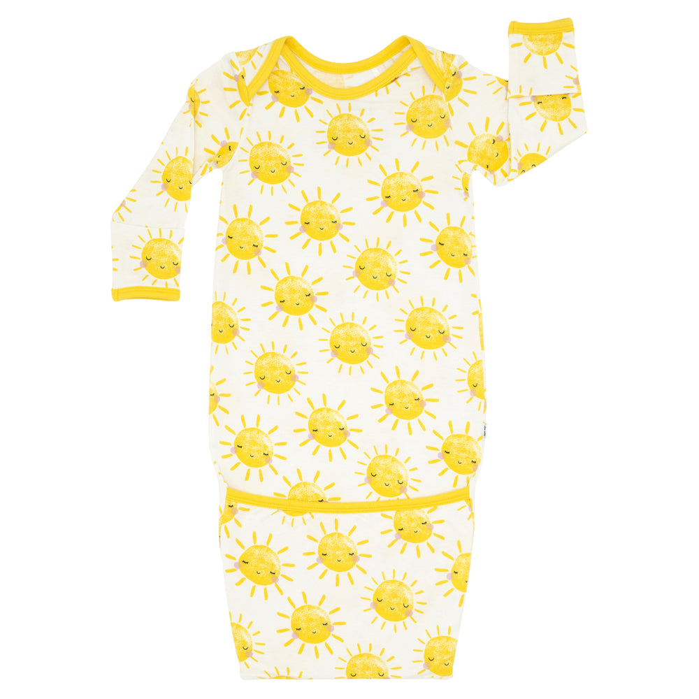 Flat lay image of a Sunshine infant gown