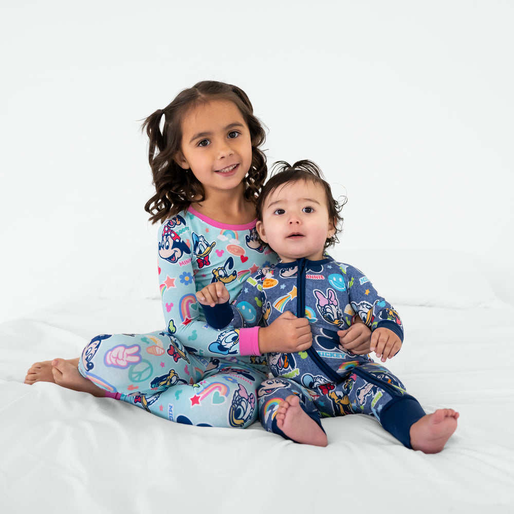 Two children wearing matching Disney Mickey's Clubhouse bamboo pajamas