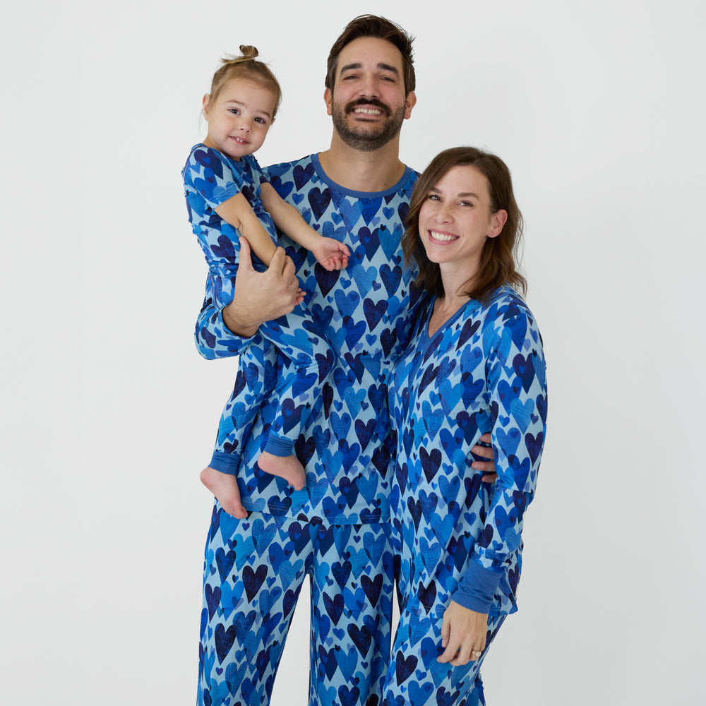 Adult and child matching in men's, women's and children's Blue Hearts & Crafts pajamas.