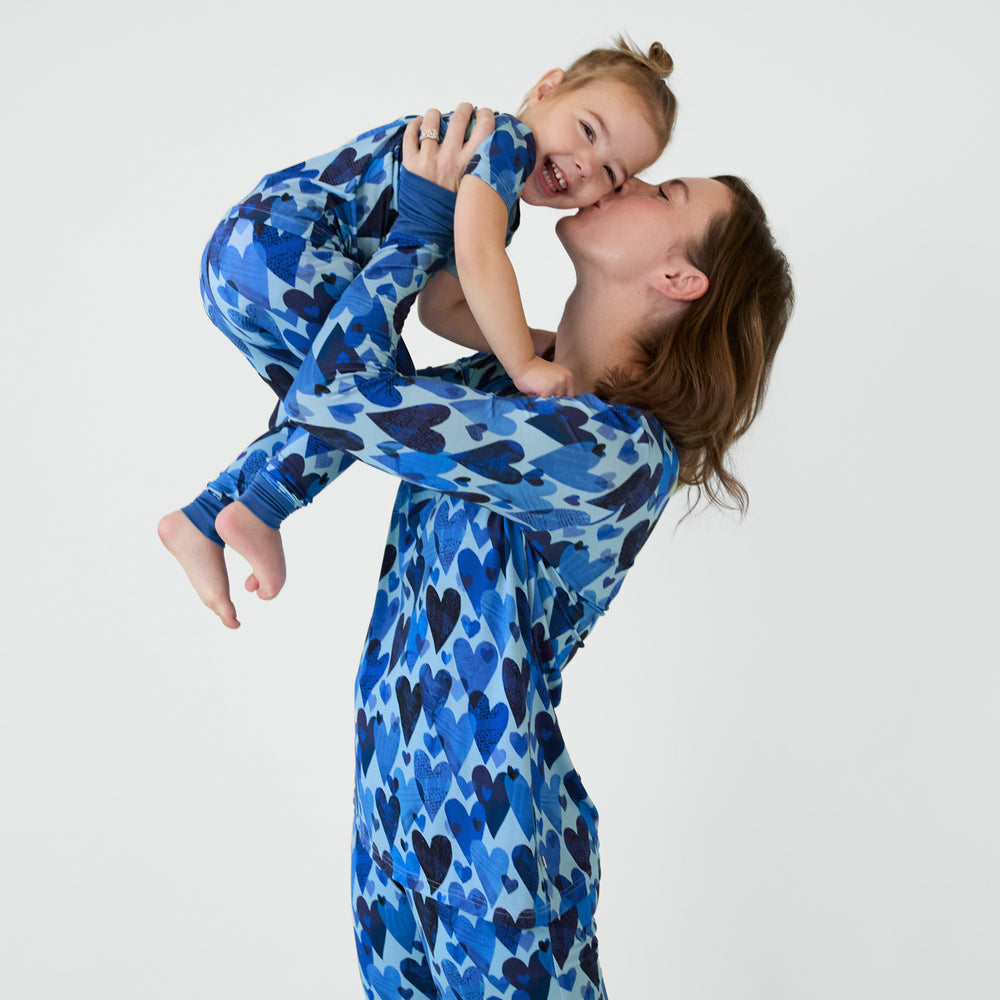 Mommy and me matching in Blue Hearts & Crafts pajamas.