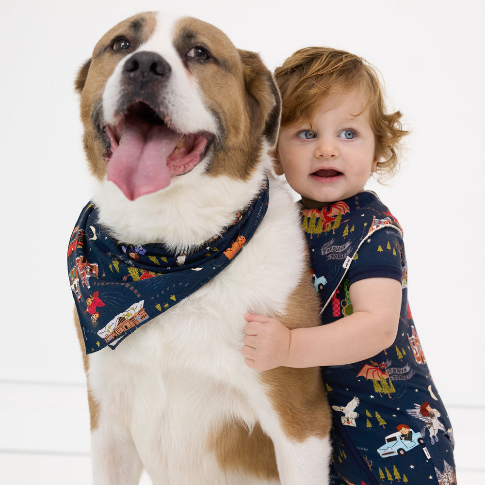 close up image of a child and their dog wearing matching an Evening at Hogwarts printed shorty zippy and pet bandana 