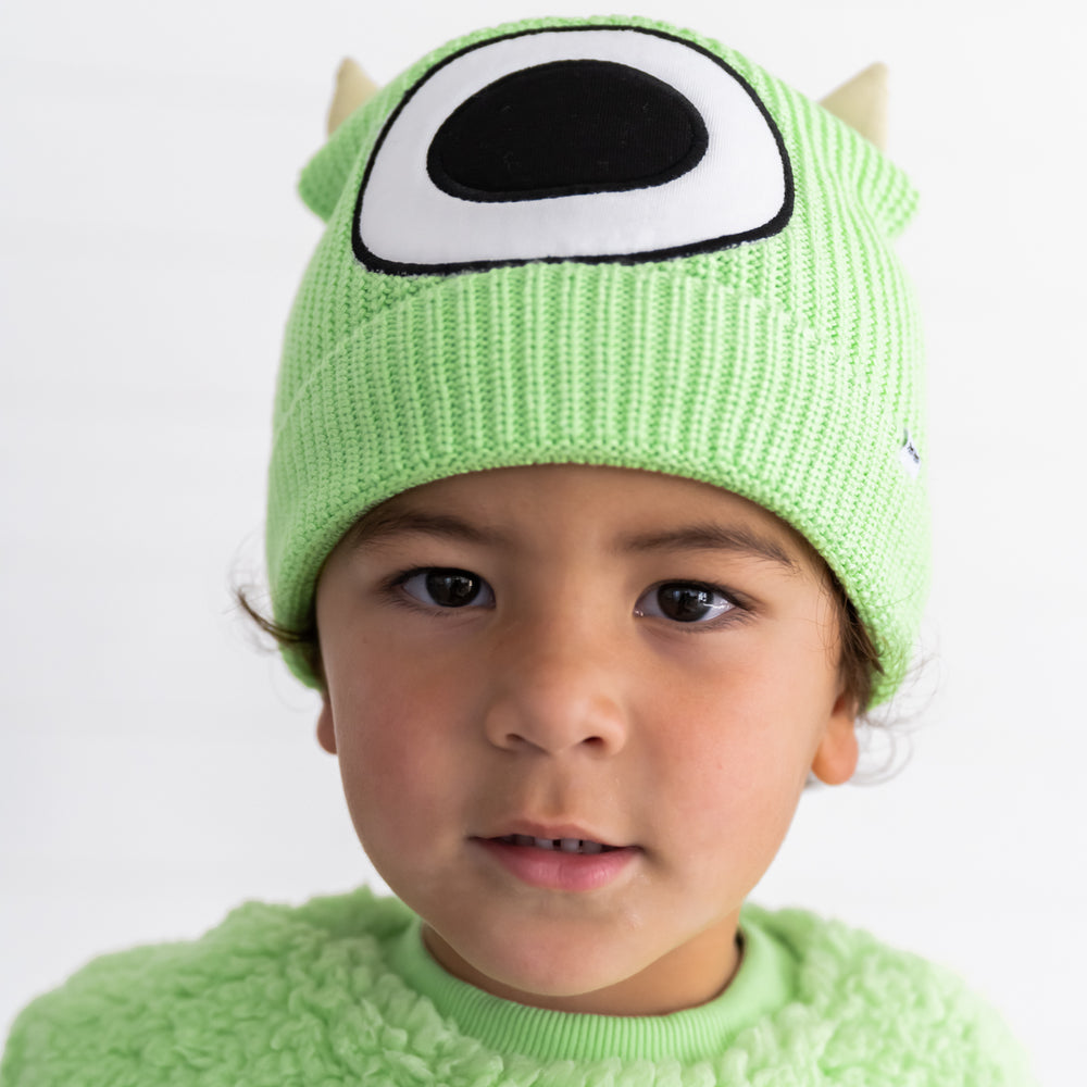 Close up image of child wearing the Disney Monsters, Inc. Mike Wazowski Beanie Hat