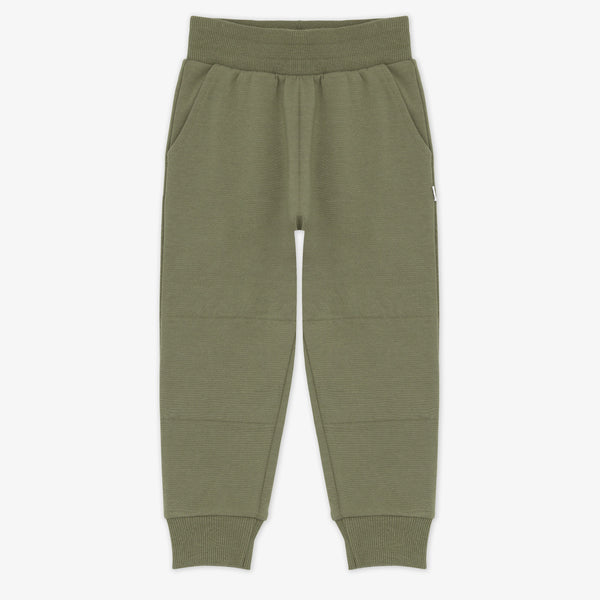 Flat lay image of the Olive Jogger