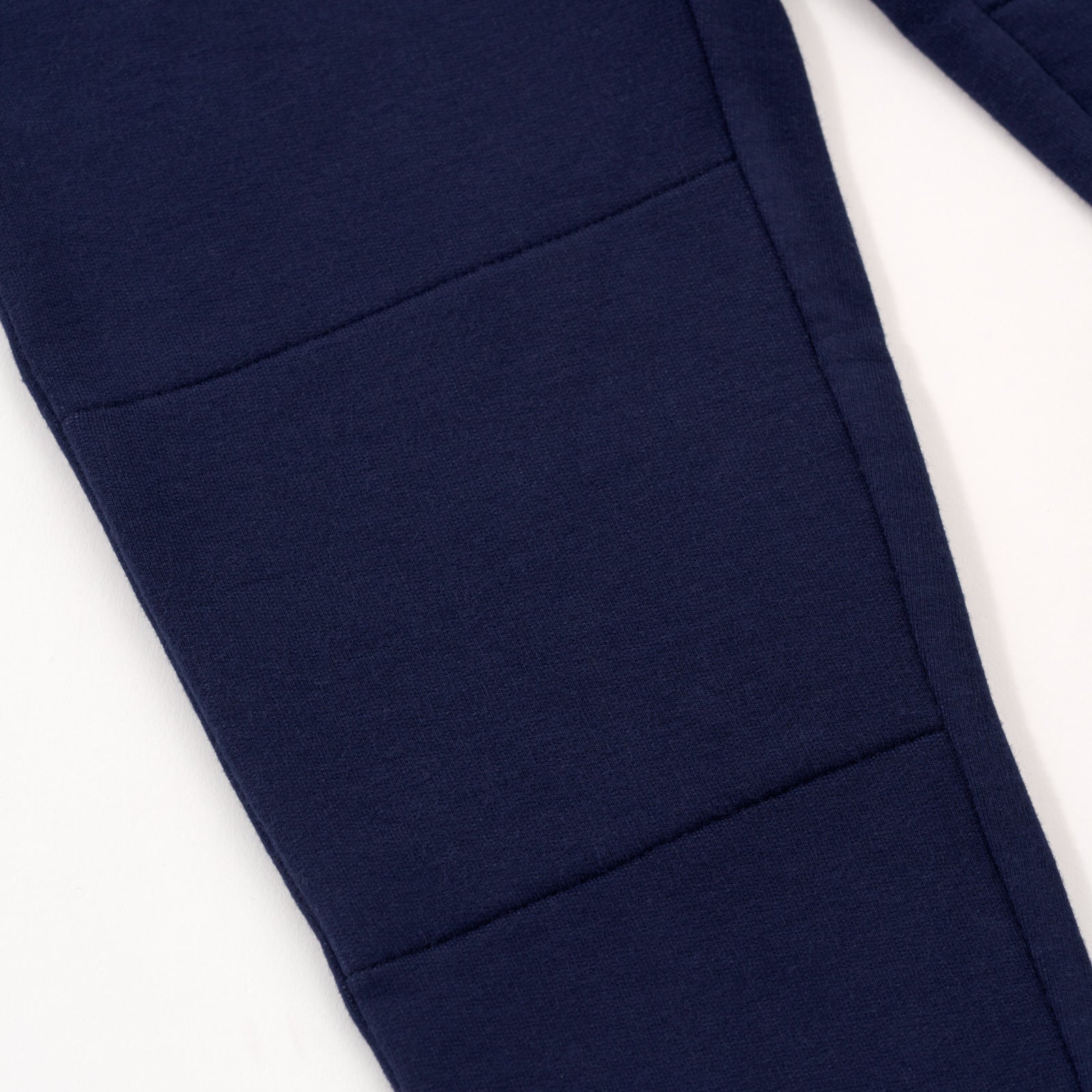 Close up knee detail image of the Classic Navy Jogger