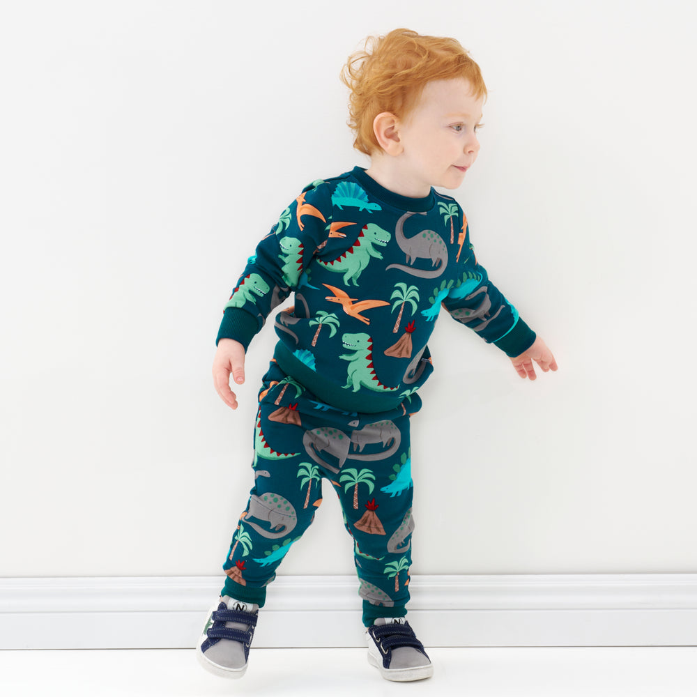 Click to see full screen - boy in matching dino crewneck and jogger