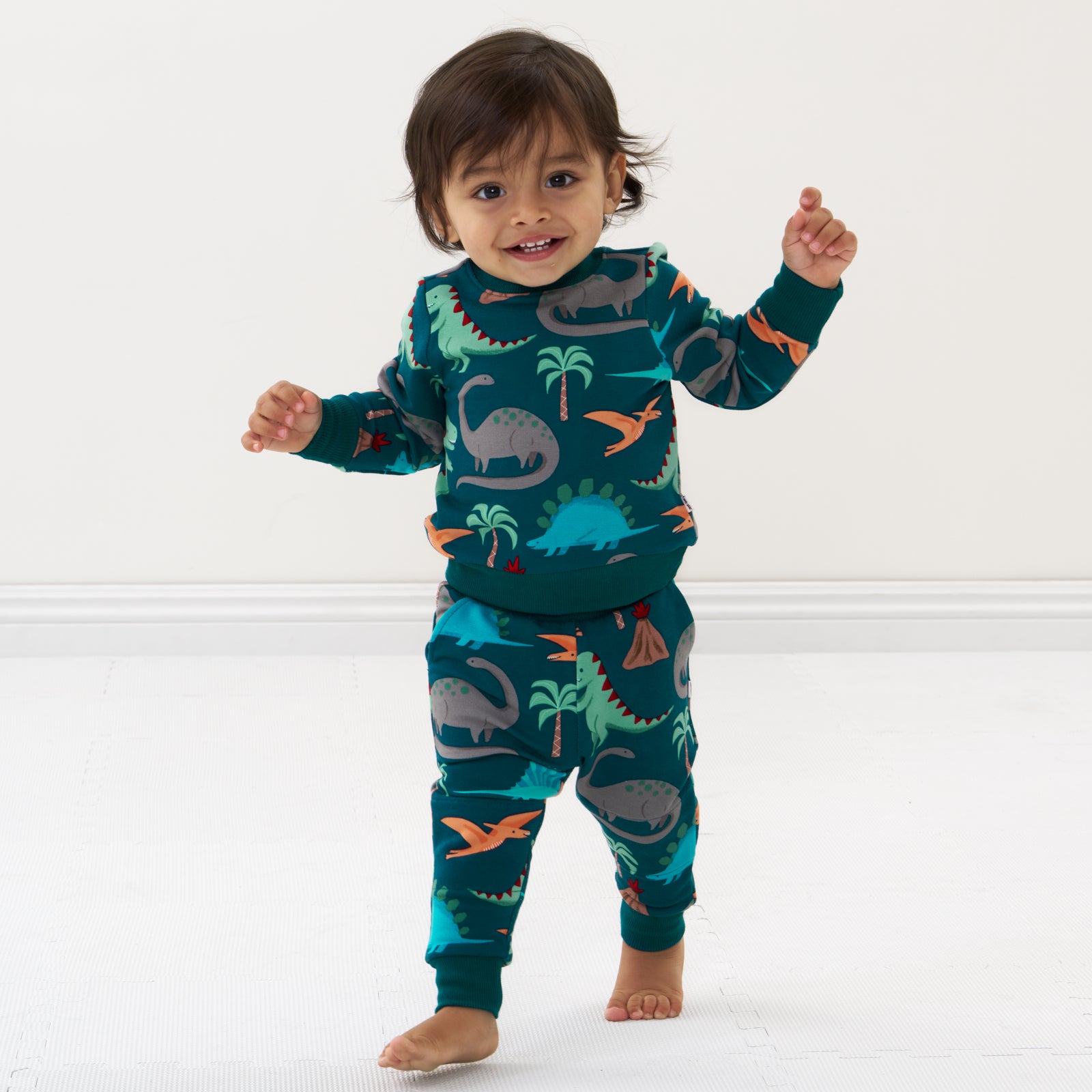Alternate image of a child wearing Teal Prehistoric Pals joggers and matching crewneck sweatshirt