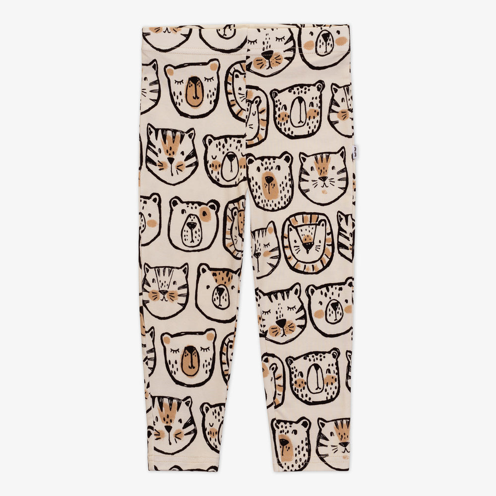 Flat lay of a Lions, Tigers & Bears legging featuring black and tan animal illustrations