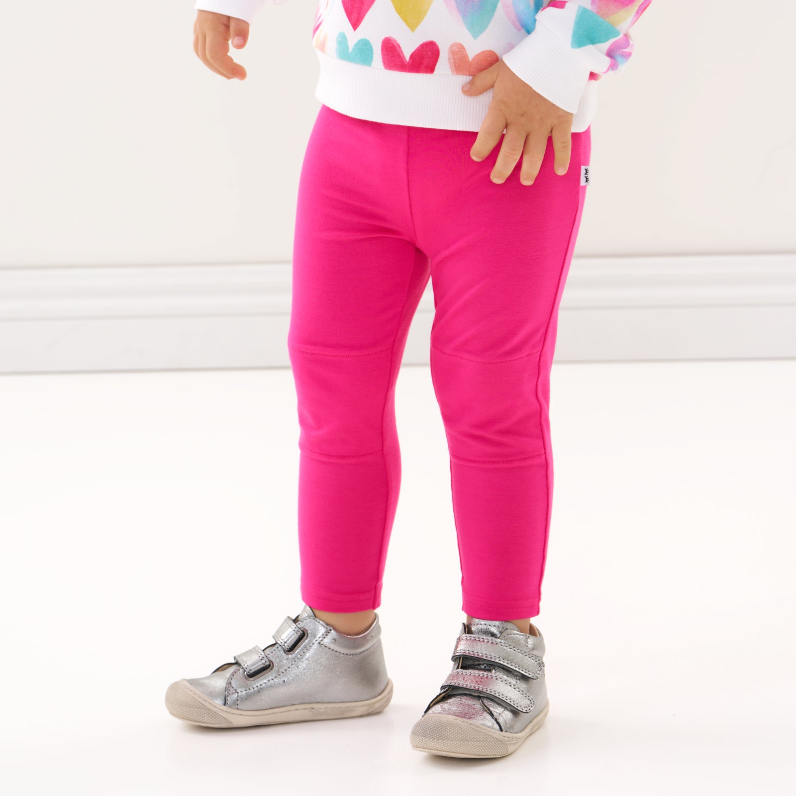 Alternate close up image of a child wearing Pink Punch leggings