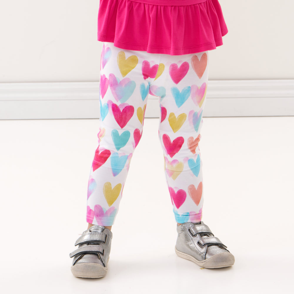 Click to see full screen - Alternate close up image of a child wearing Watercolor Love leggings
