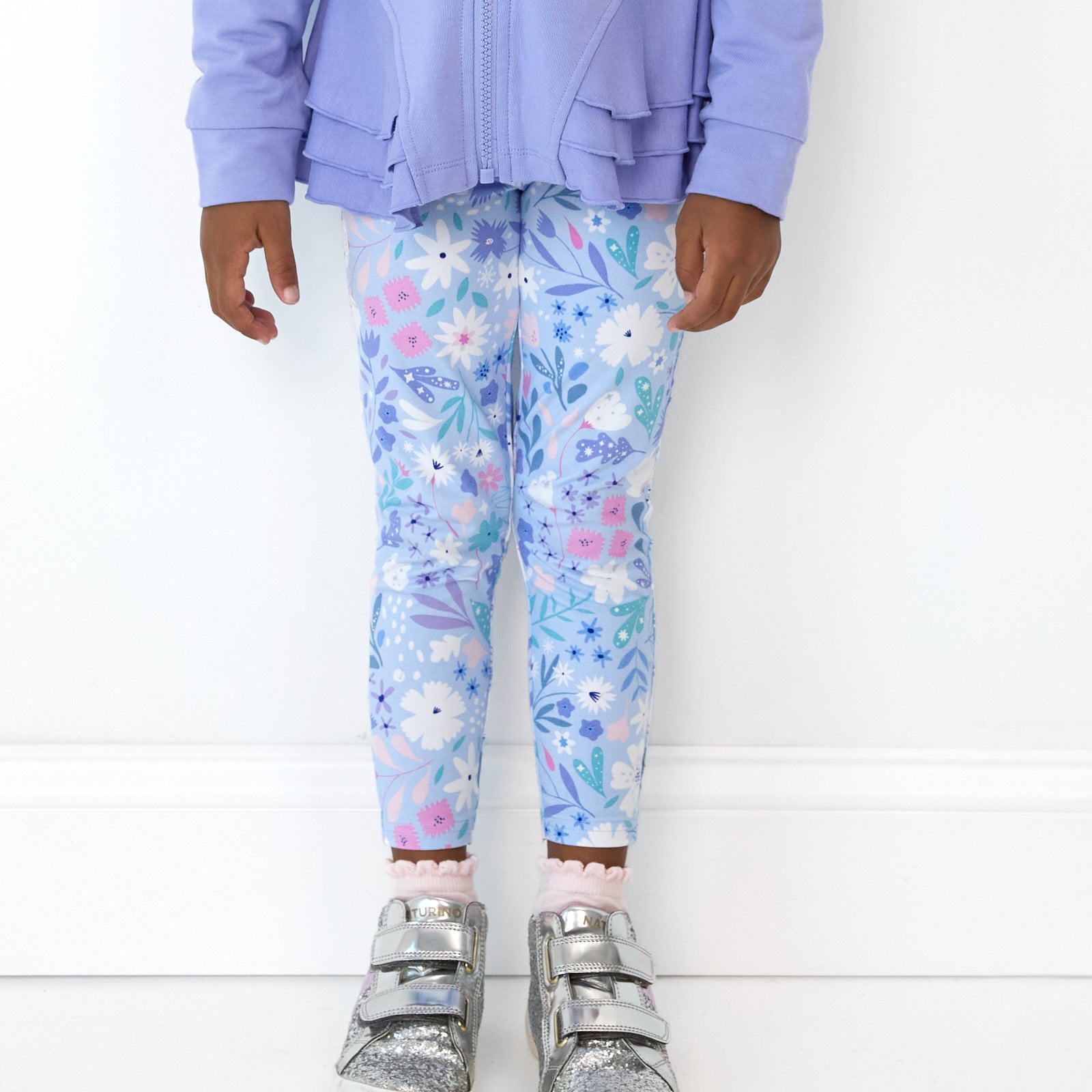 Close up image of girl wearing the Magical Meadow Legging