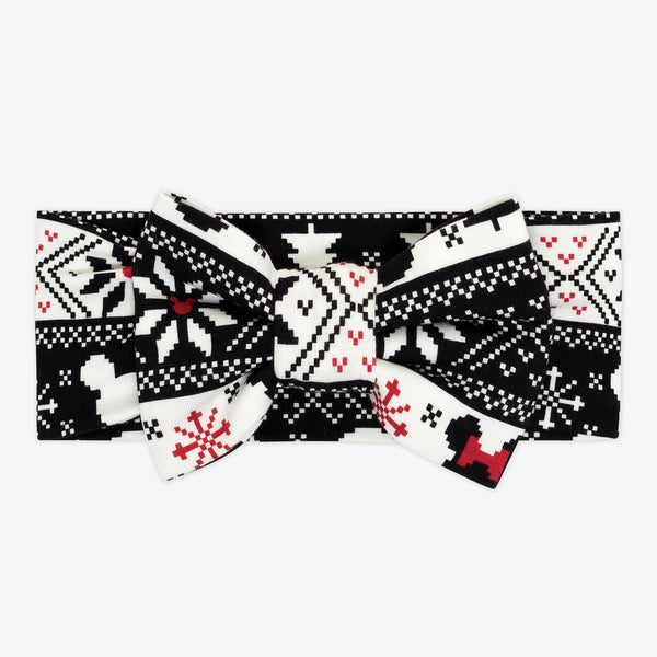 Flat lay image of a Mickey Fair Isle luxe bow headband