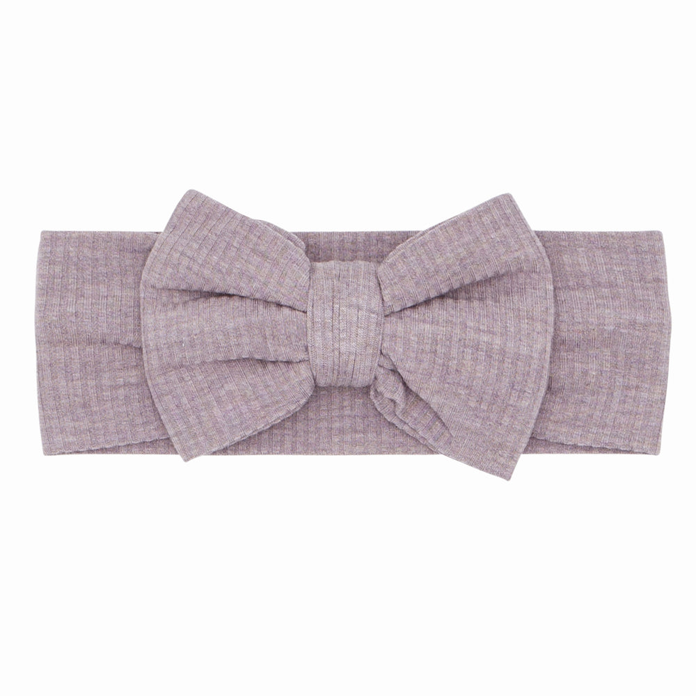 Click to see full screen - Flat lay image of a Heather Smokey Lavender Ribbed Luxe Bow Headband 