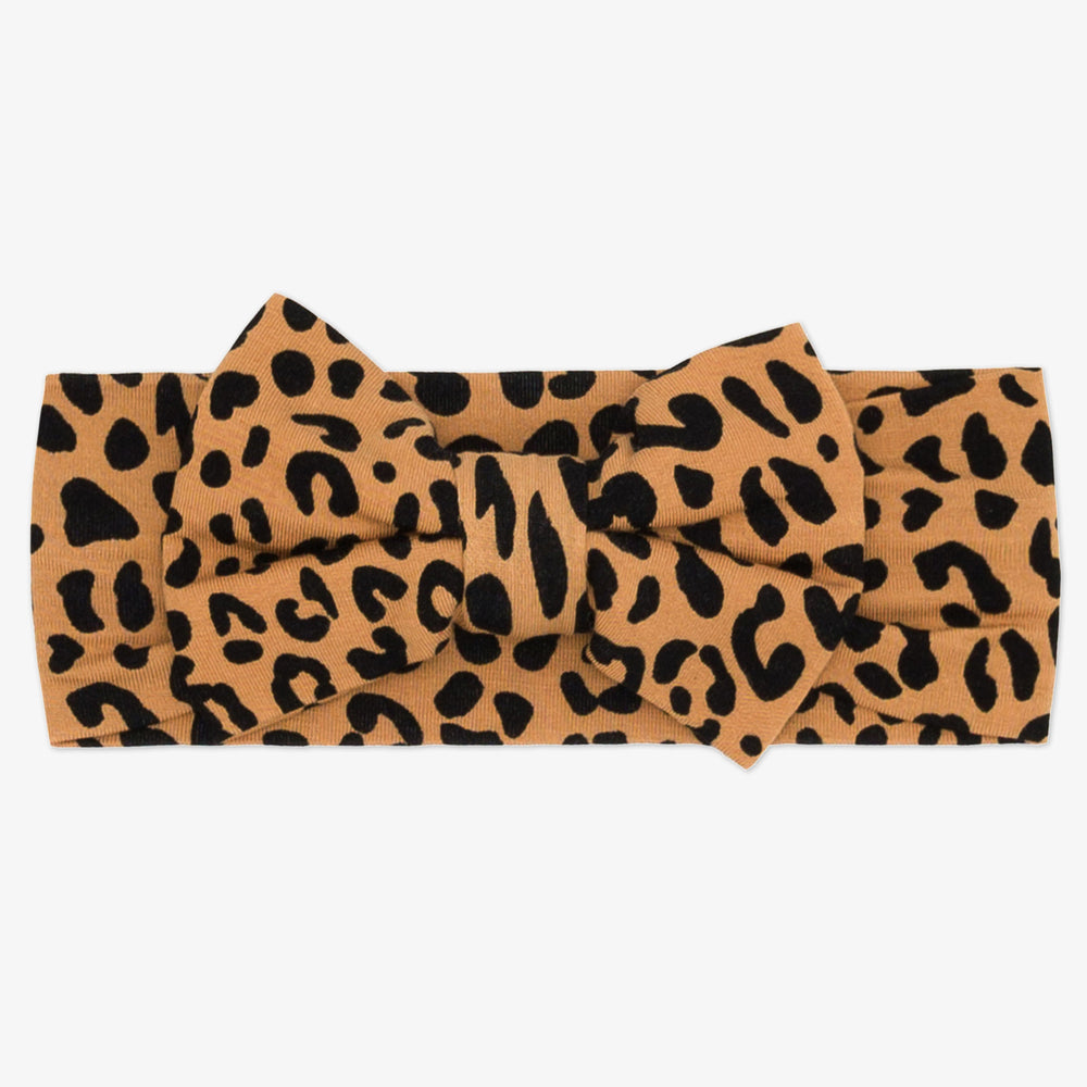 Flat lay image of the Classic Leopard Luxe Bow Headband