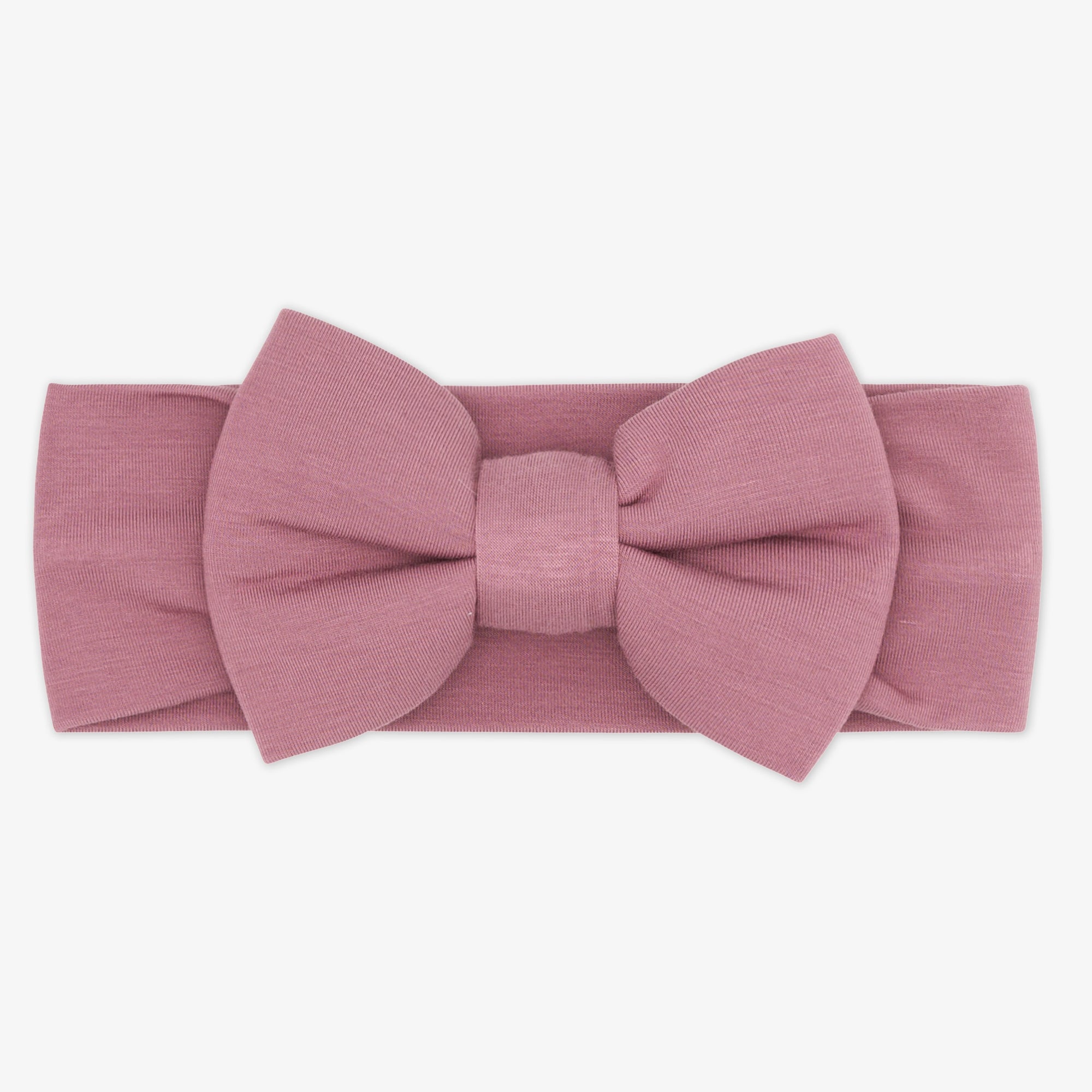 flat lay image of Dusty Plum luxe bow headband