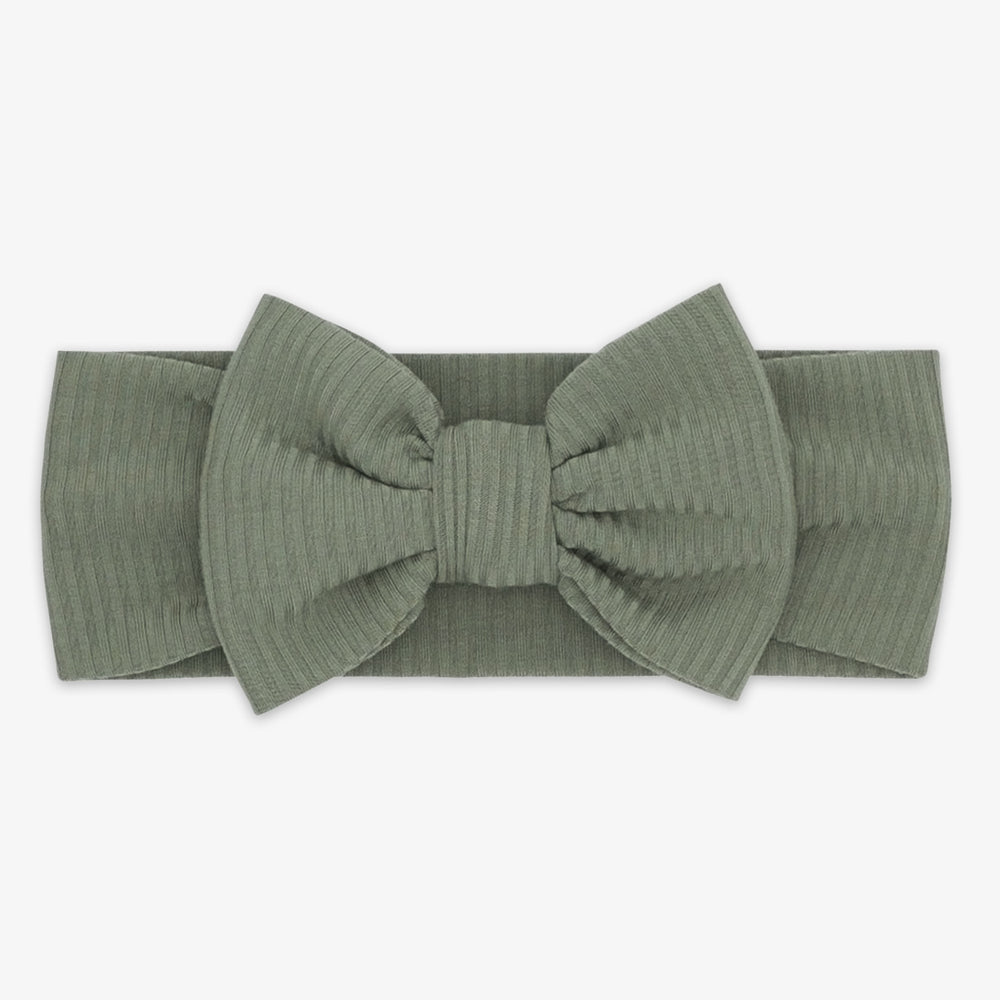 Flat lay image of the Moss Ribbed Luxe Bow Headband