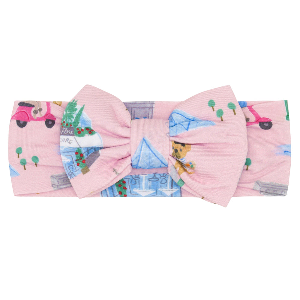Flat lay image of the Pink Weekend in Paris Luxe Bow Headband